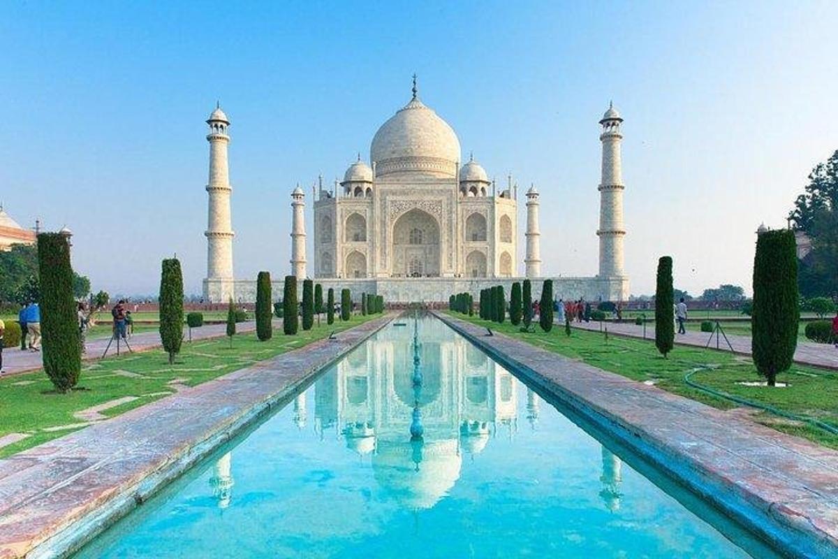 a view of the taj mahal with a pool in front of it