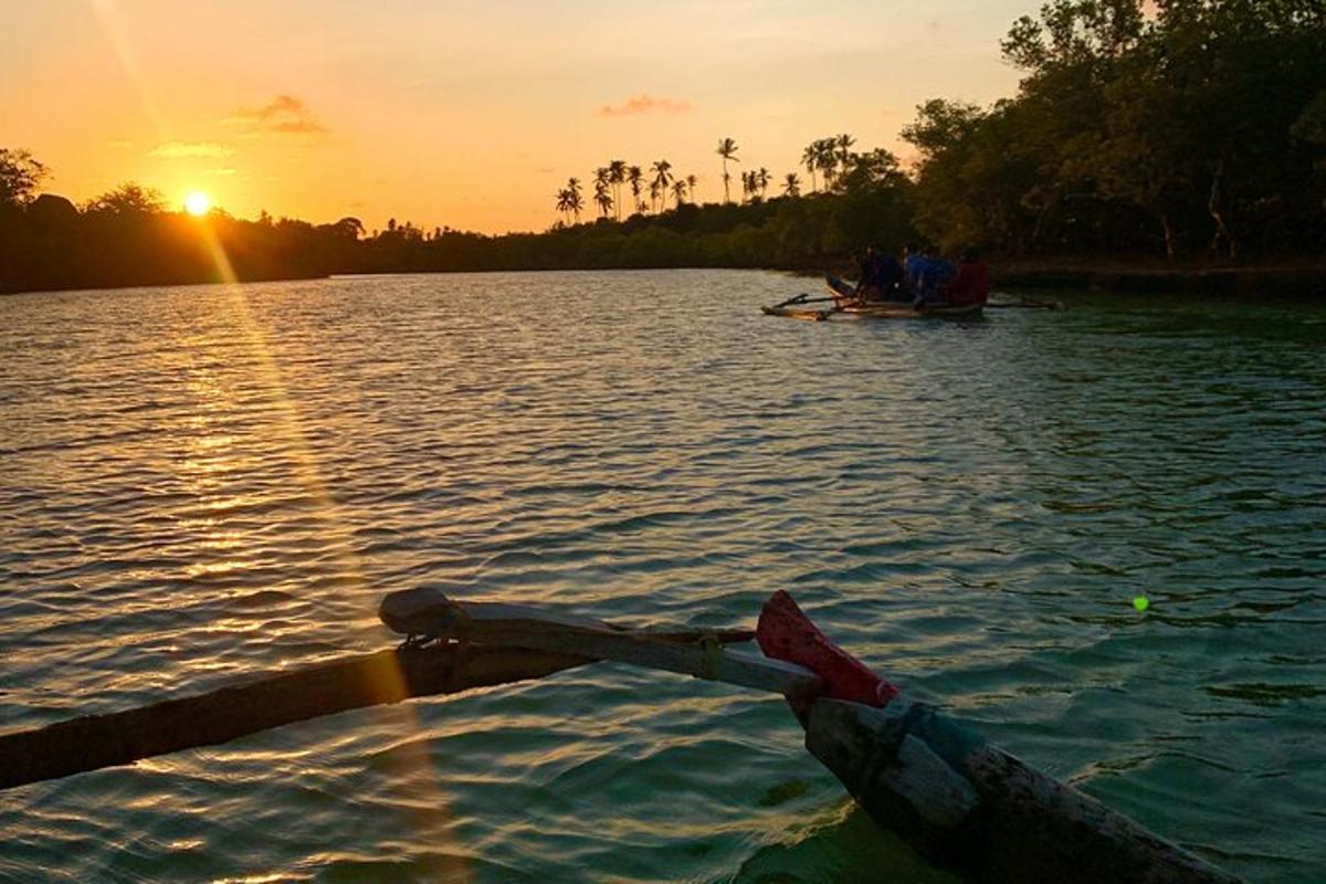 a group of people in a boat on a lake