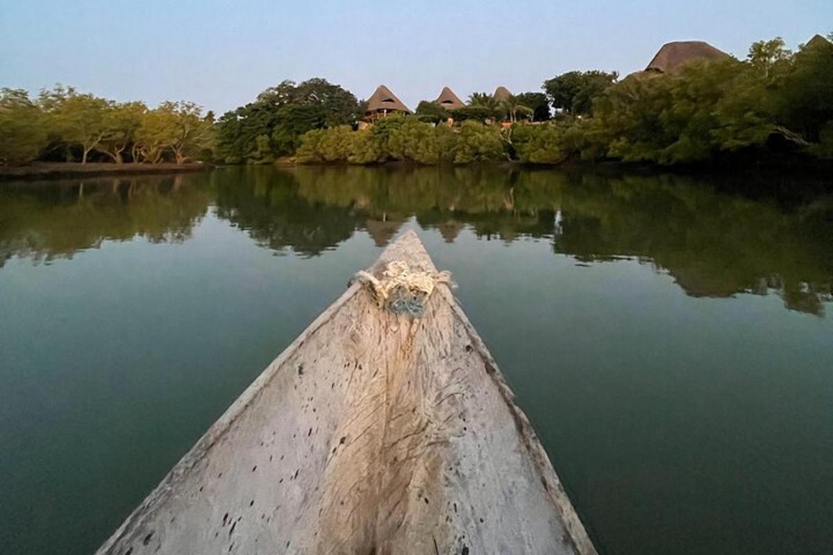a view from the inside of a boat on a river