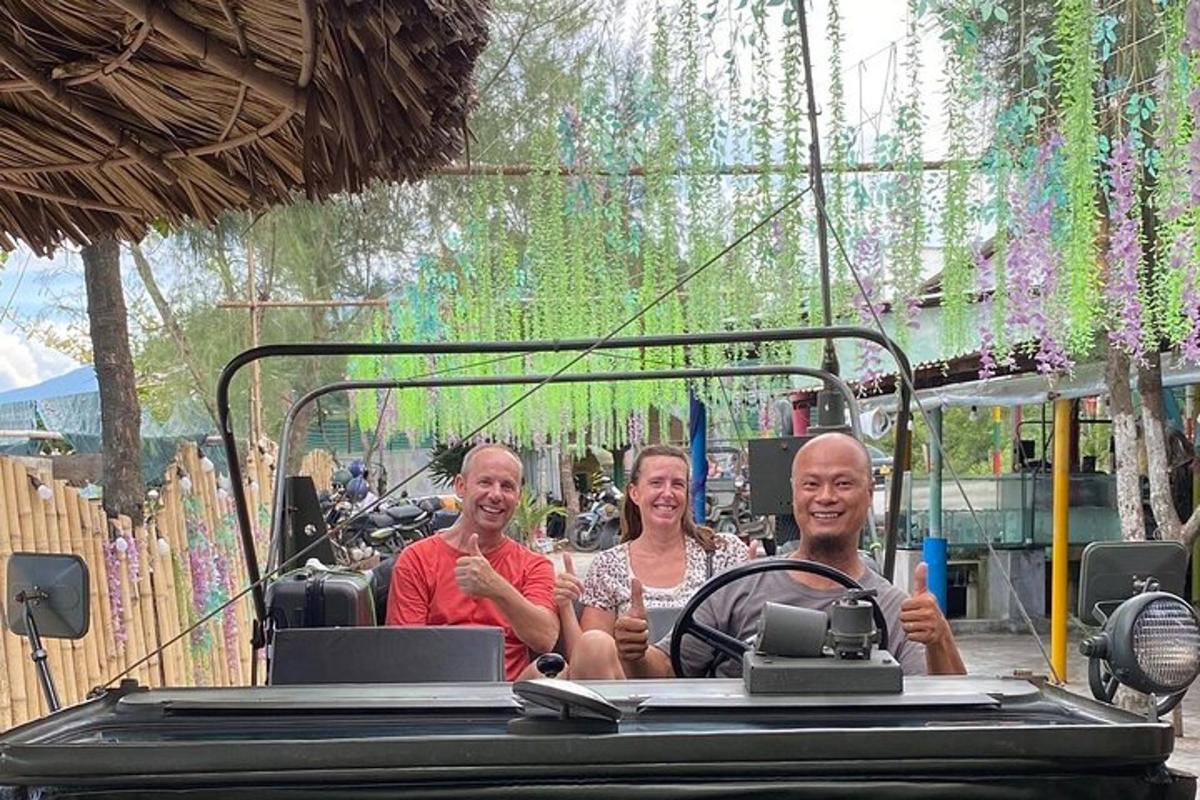 a group of three men sitting in a golf cart