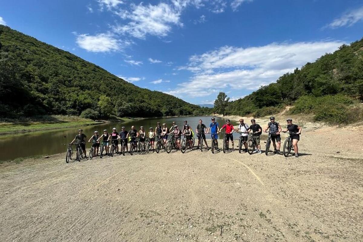 a group of people riding bikes on a river