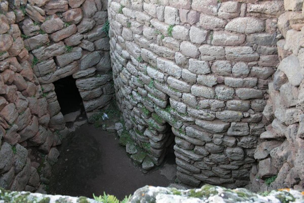 a stone building with a tunnel in it