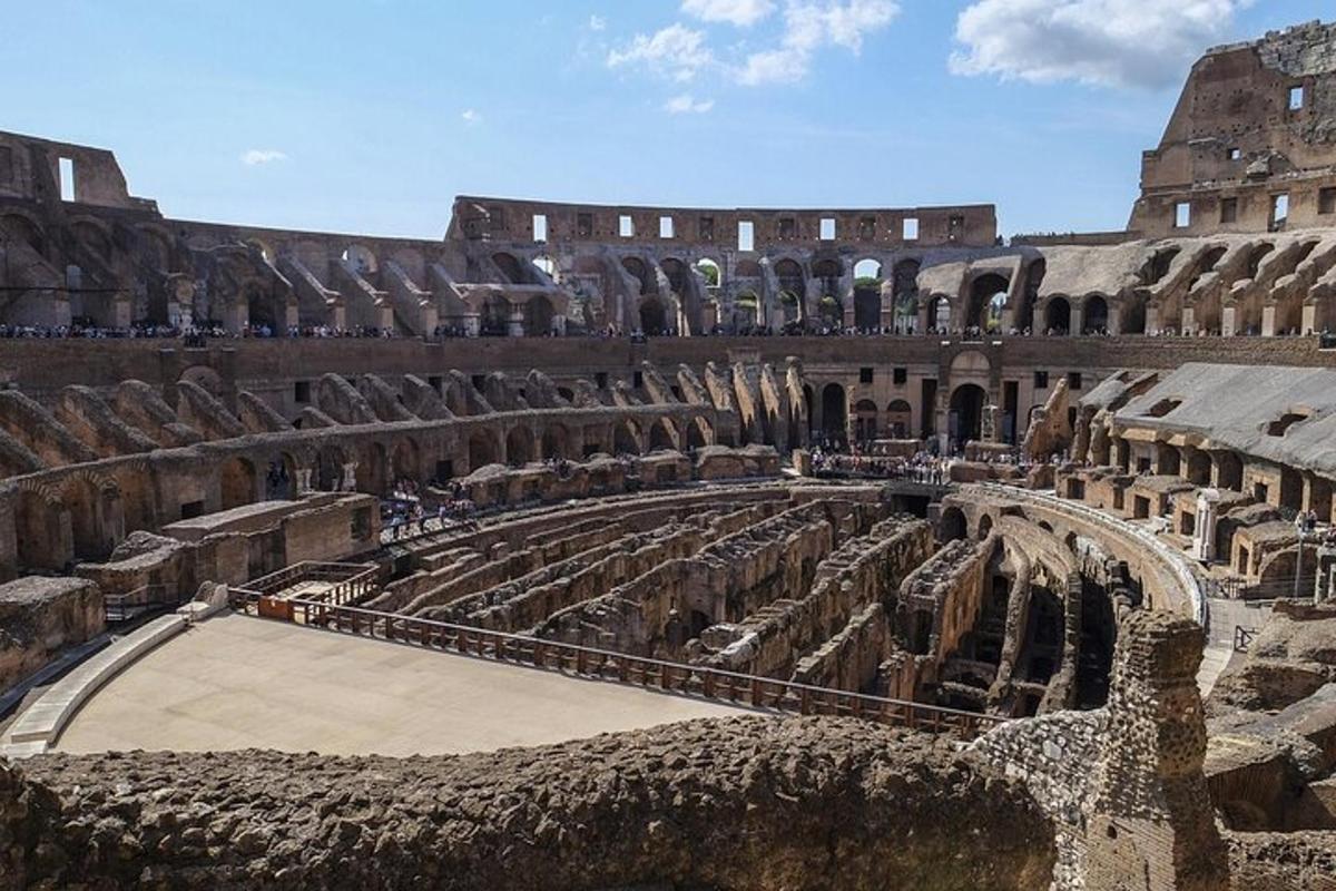 an amphitheatre in the colosseum with people in it
