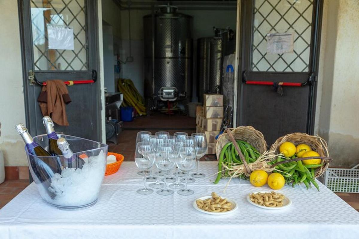 a table with wine glasses and food on it