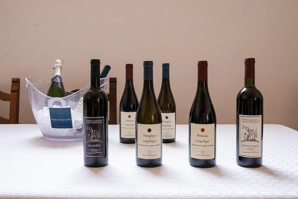 a group of wine bottles sitting on a table