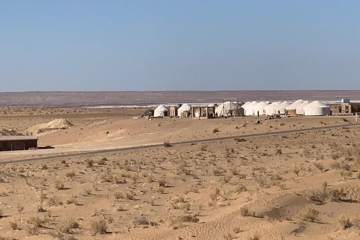 a group of domes in the middle of a desert