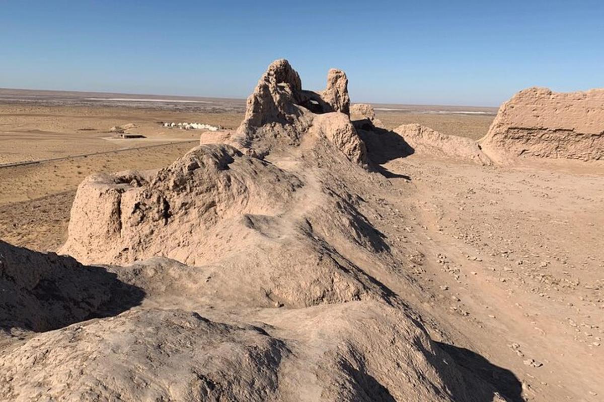a rock formation in the middle of a desert
