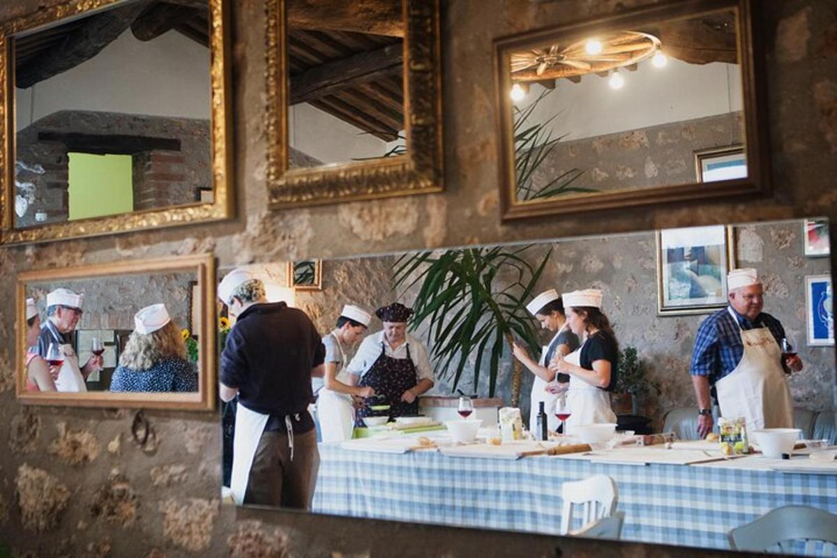 a group of chefs preparing food in a restaurant