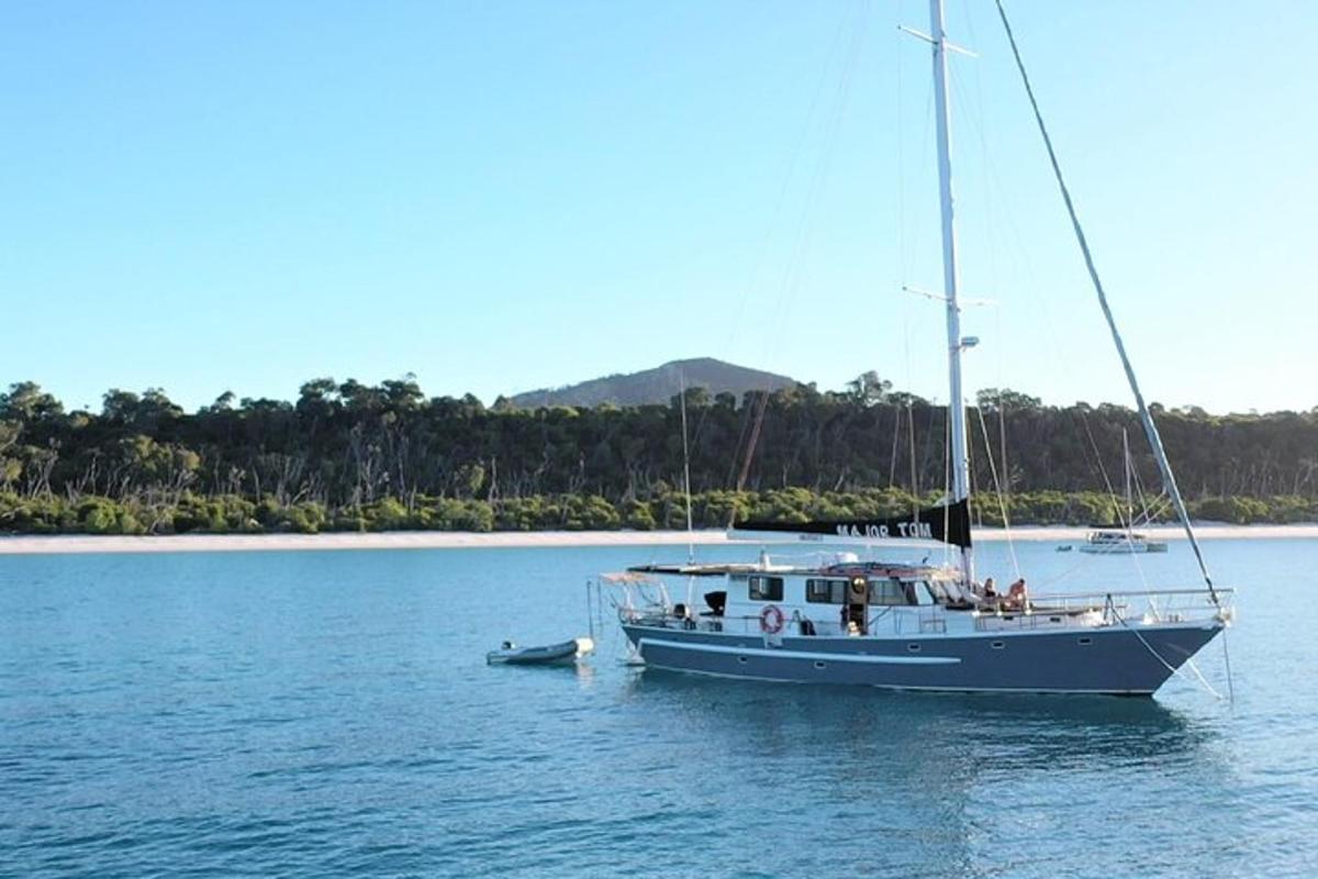 a boat in the water with people on it