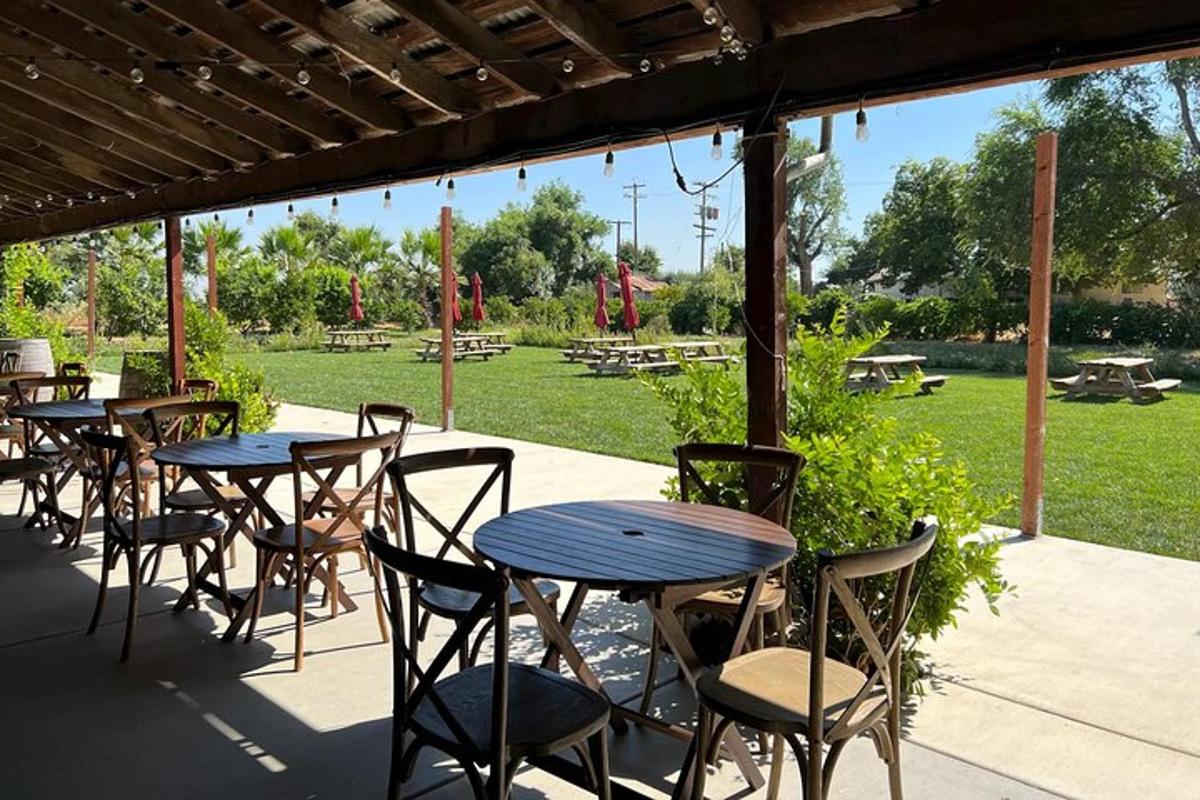 a row of tables and chairs on a patio