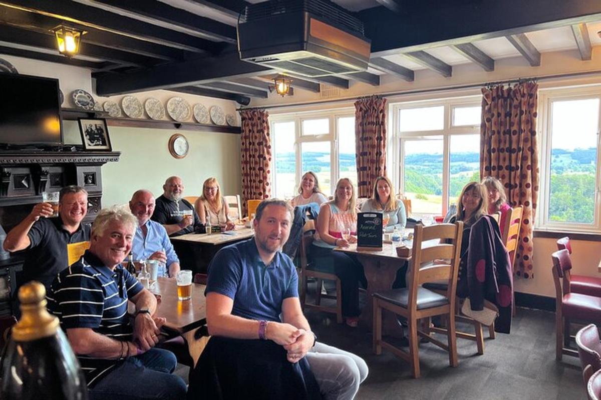 a group of people sitting at tables in a restaurant
