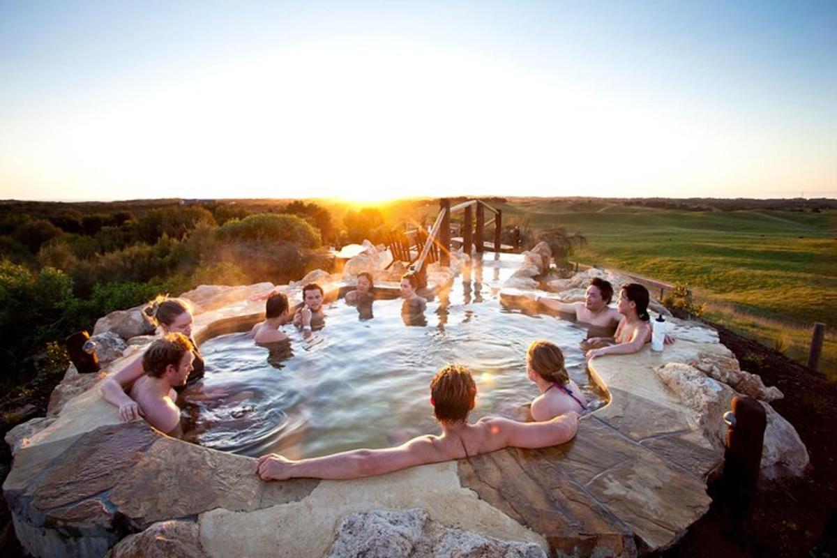 a group of people are in a hot tub