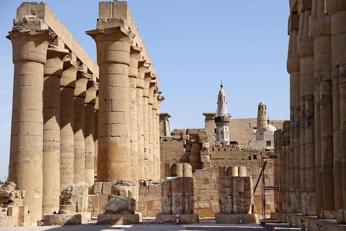 a view of the ruins of a building with columns