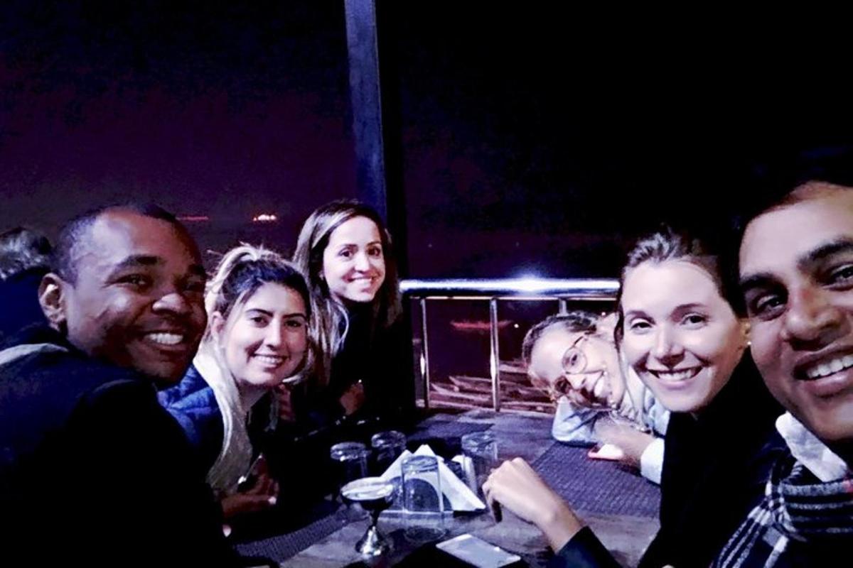 a group of people sitting at a table