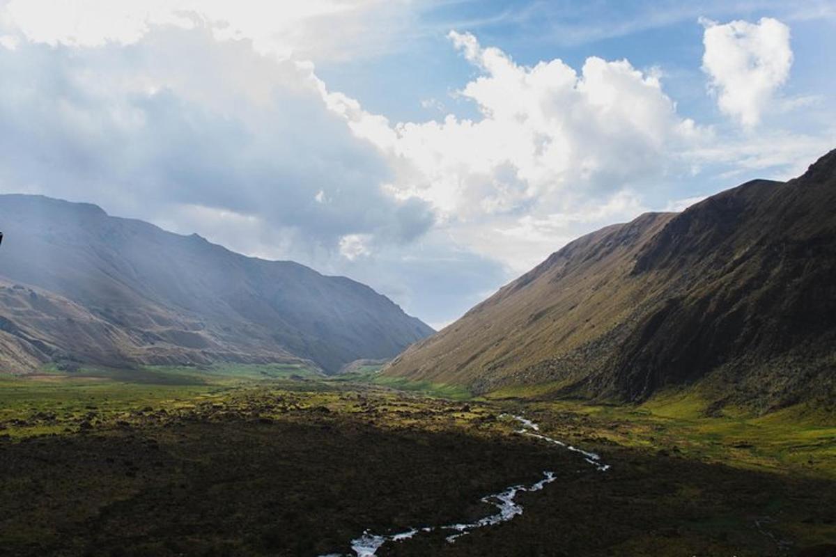 a view of a mountain valley with a river