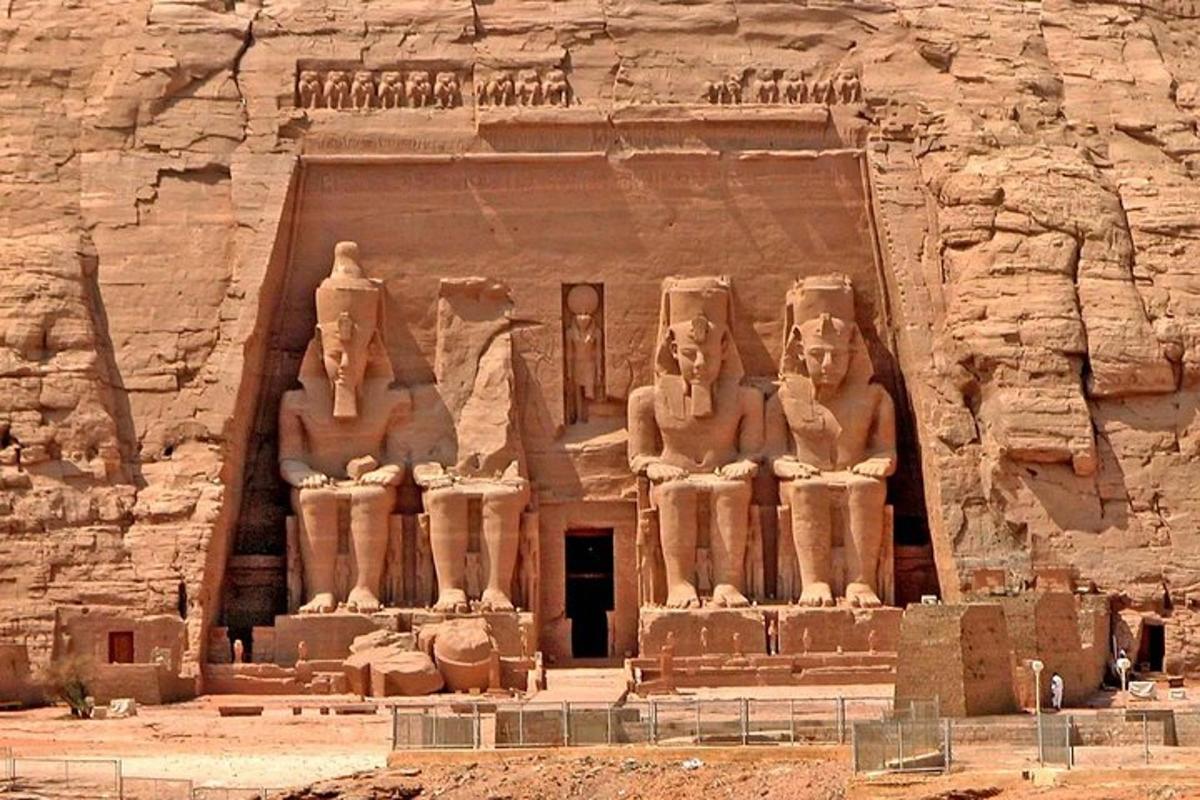 a large stone building with statues on it