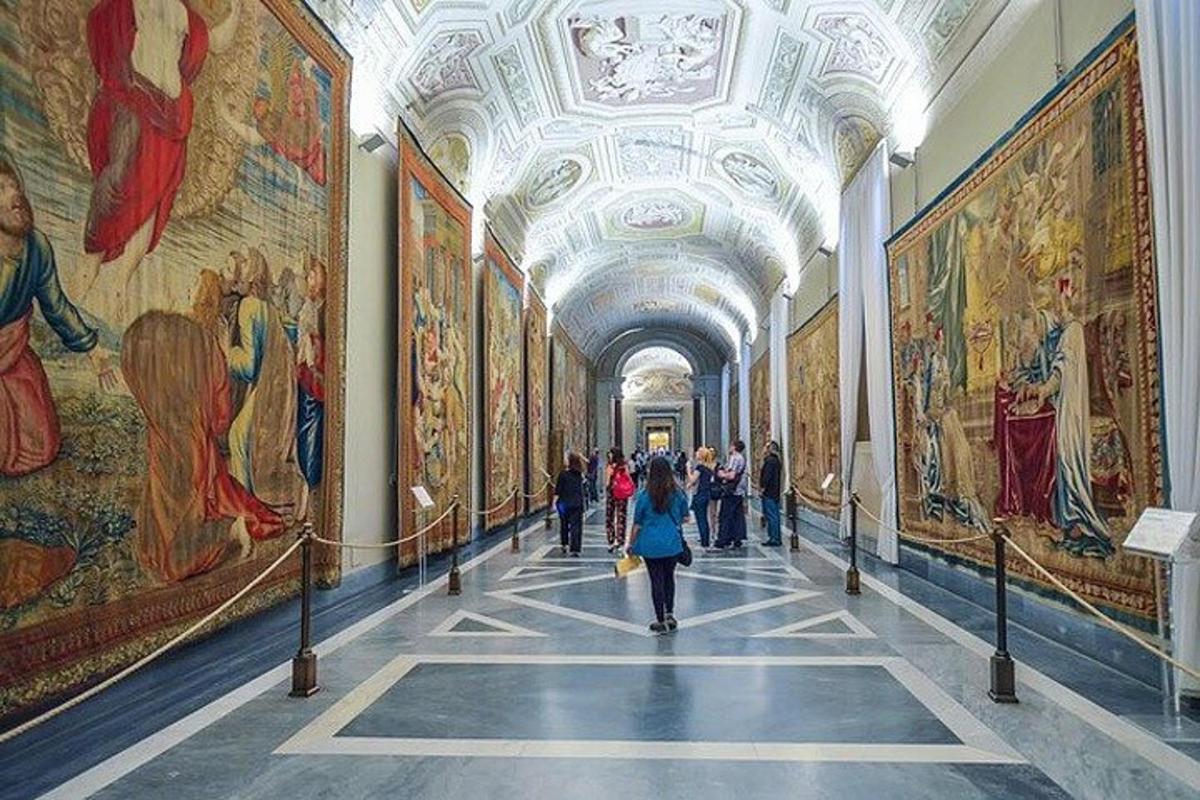 a hallway in a museum with paintings on the walls