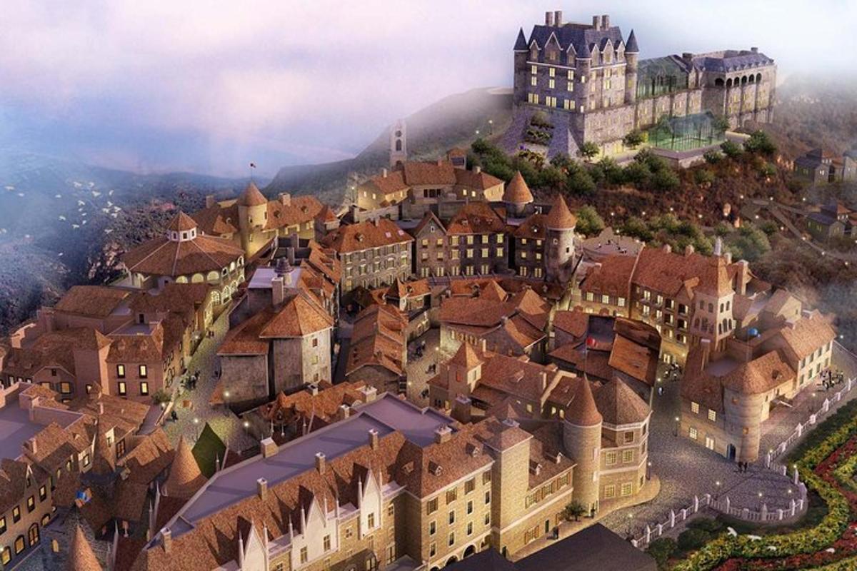 Una vista aérea de una ciudad con un castillo en una colina.