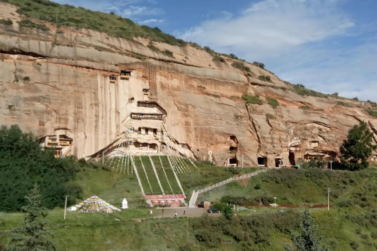 a building on the side of a mountain