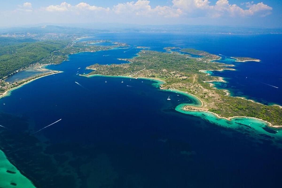 an aerial view of a group of islands in the water