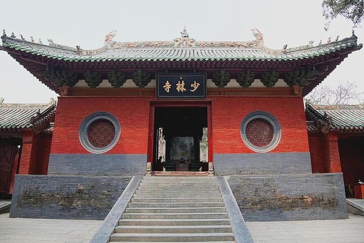 a red building with a sign on the front of it