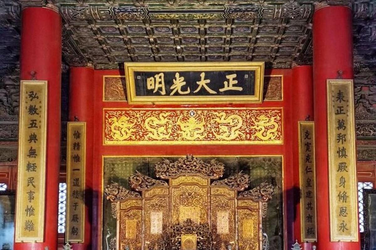 a room with a gold door in a building