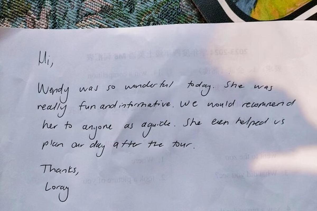 a piece of paper with a handwritten letter on it