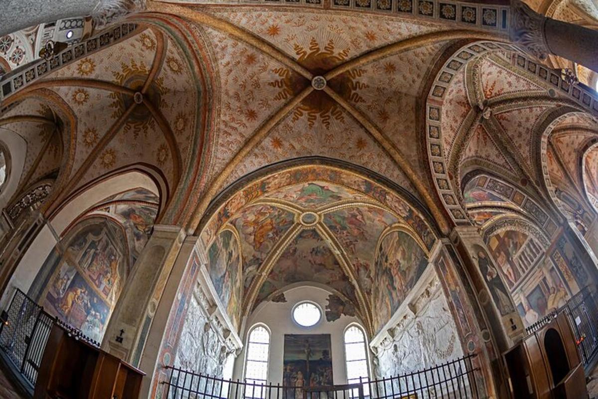 a large room with paintings on the ceilings of a building