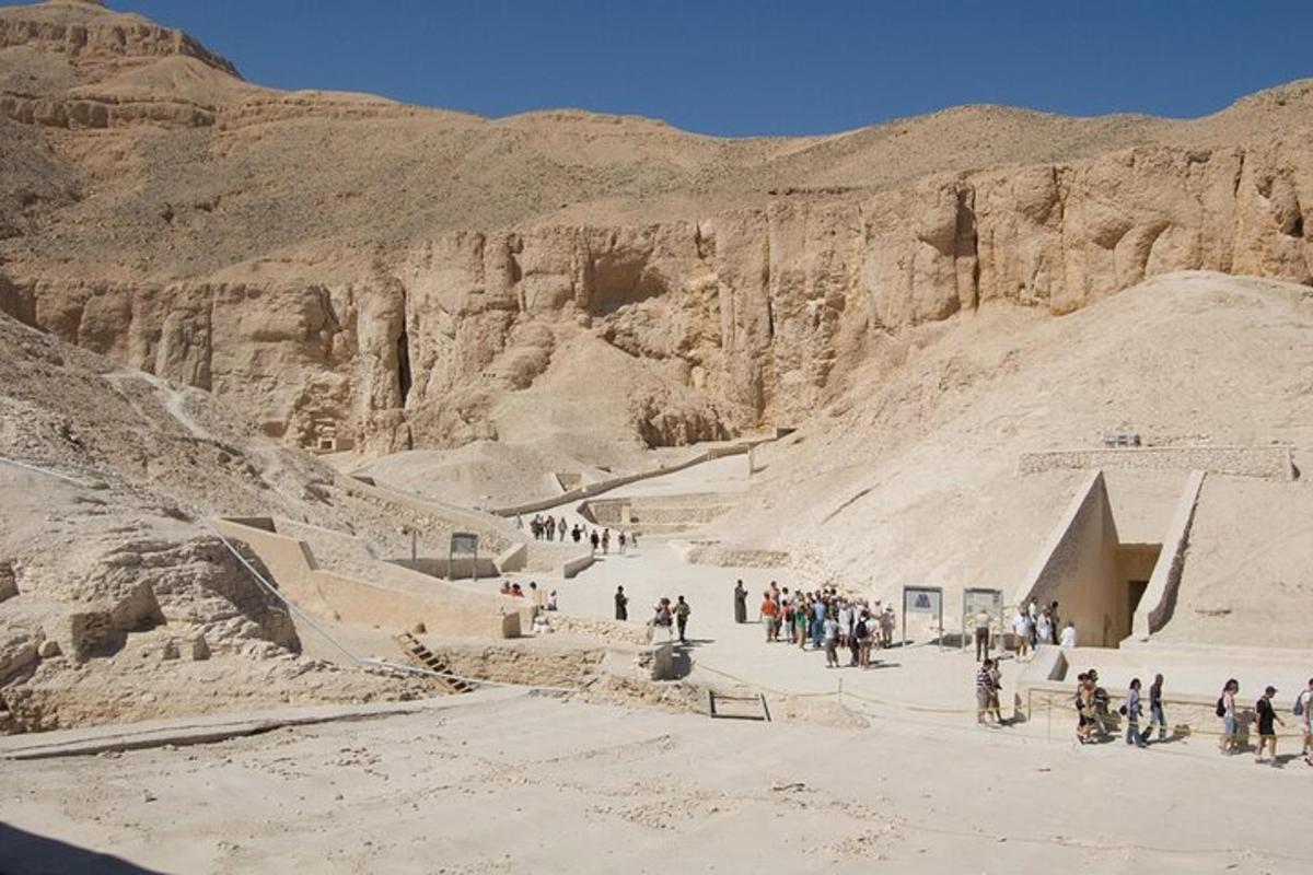 a group of people walking in the desert