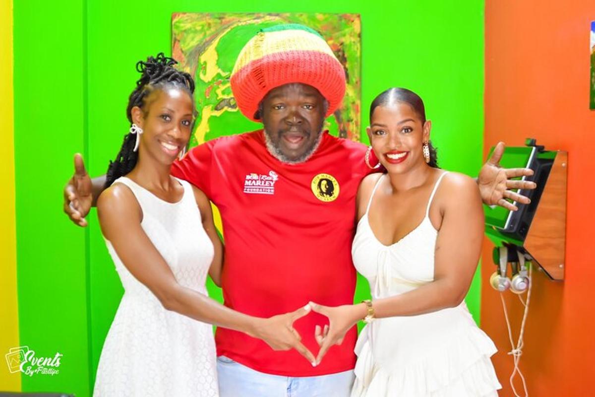 a man and two women posing for a picture
