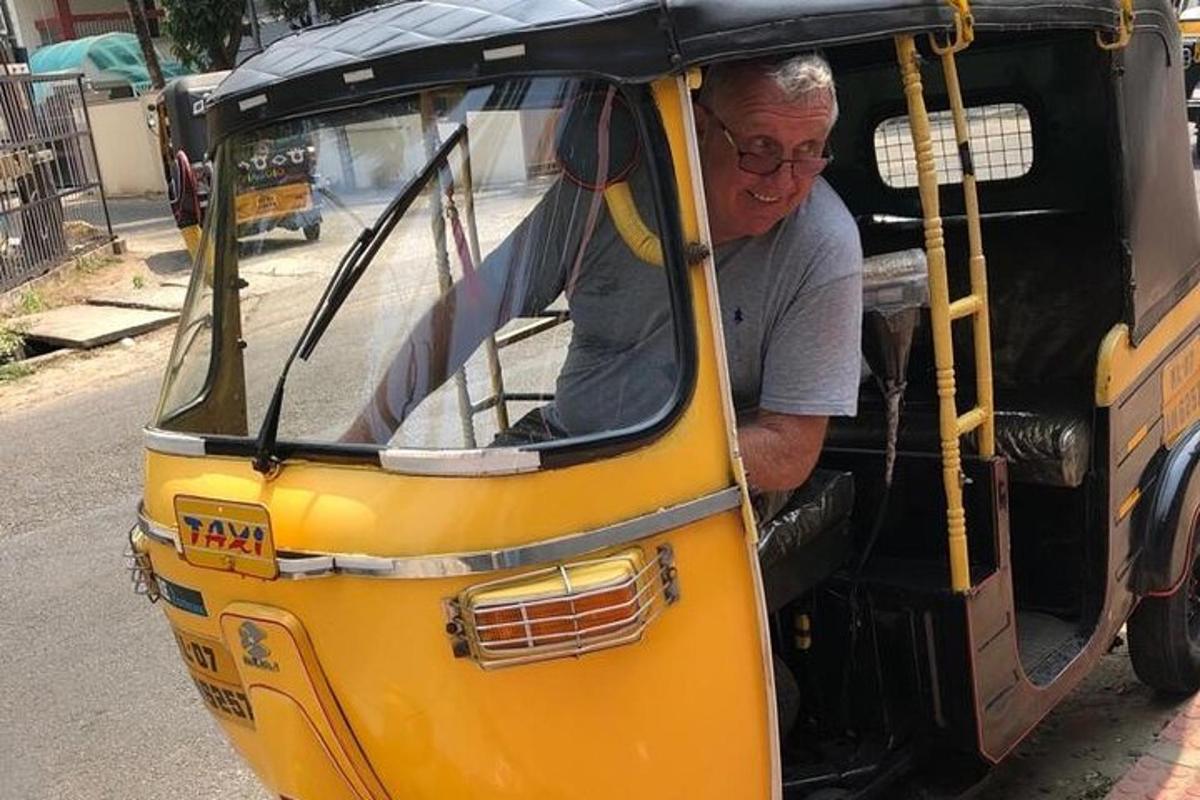 a man is sitting inside of a small bus