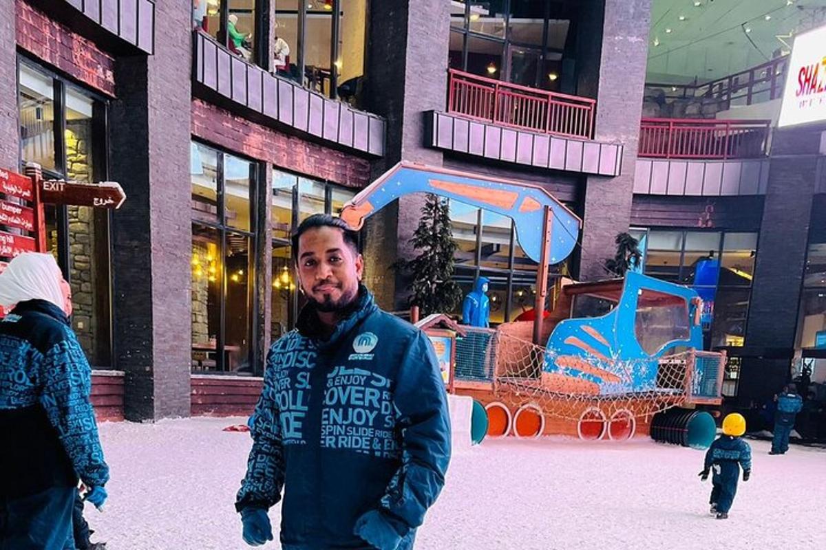 a man is standing in front of a building
