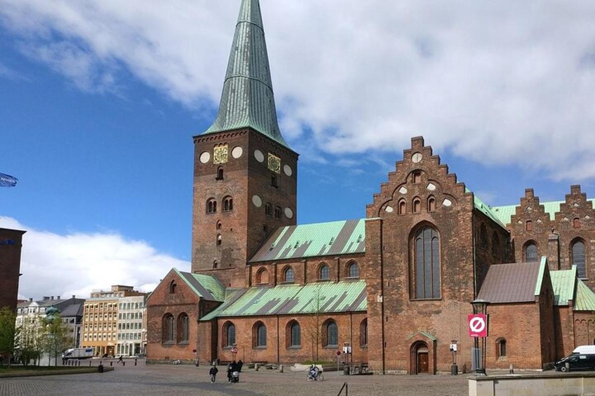 a large brick building with a clock tower