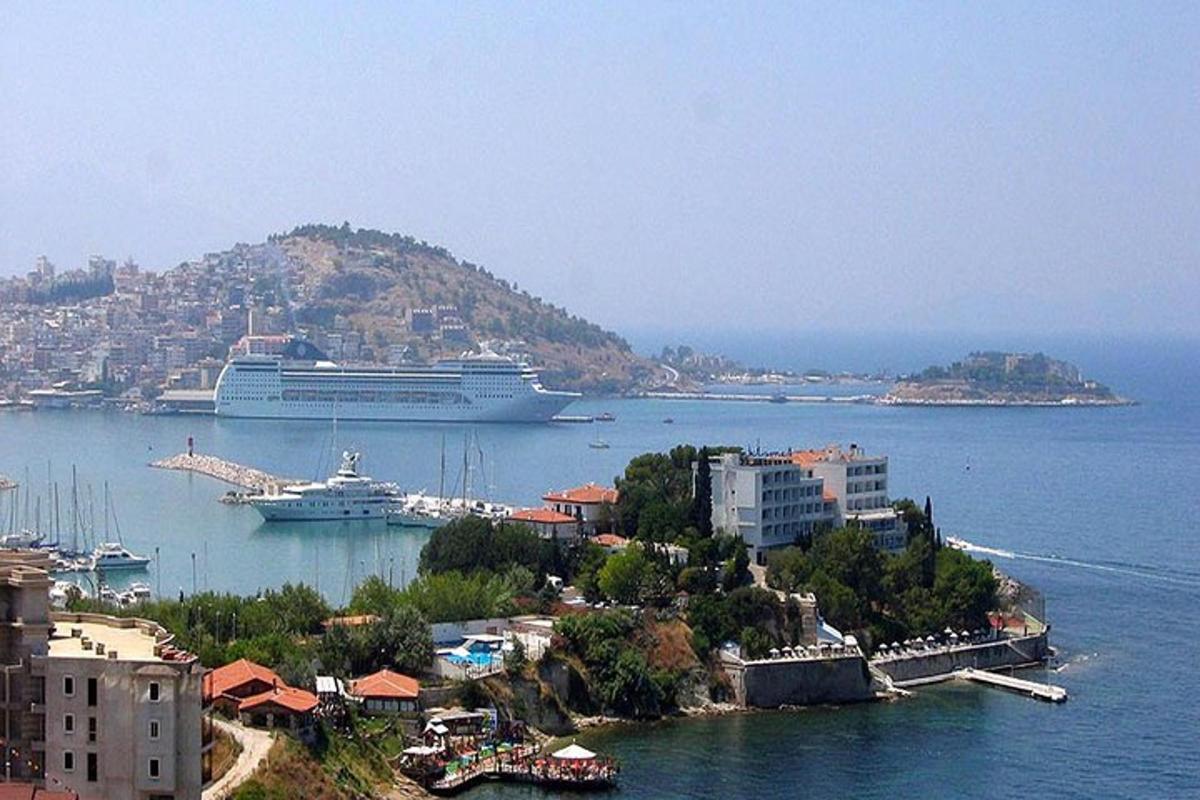 a cruise ship is docked in a harbor