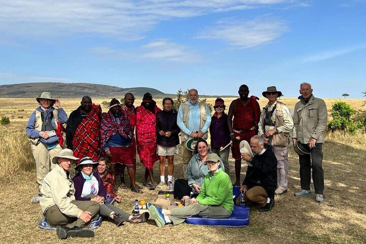 a group of people are posing for a picture