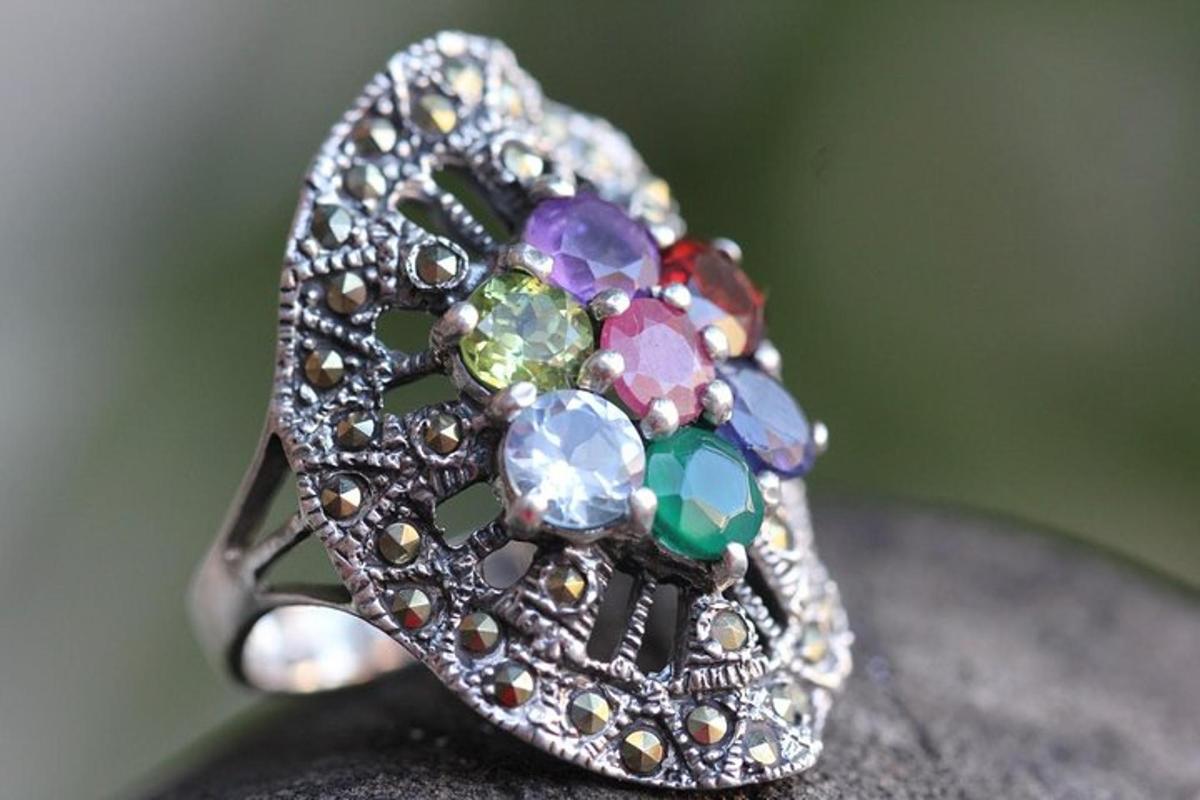 a ring with crystals and gemstones in it