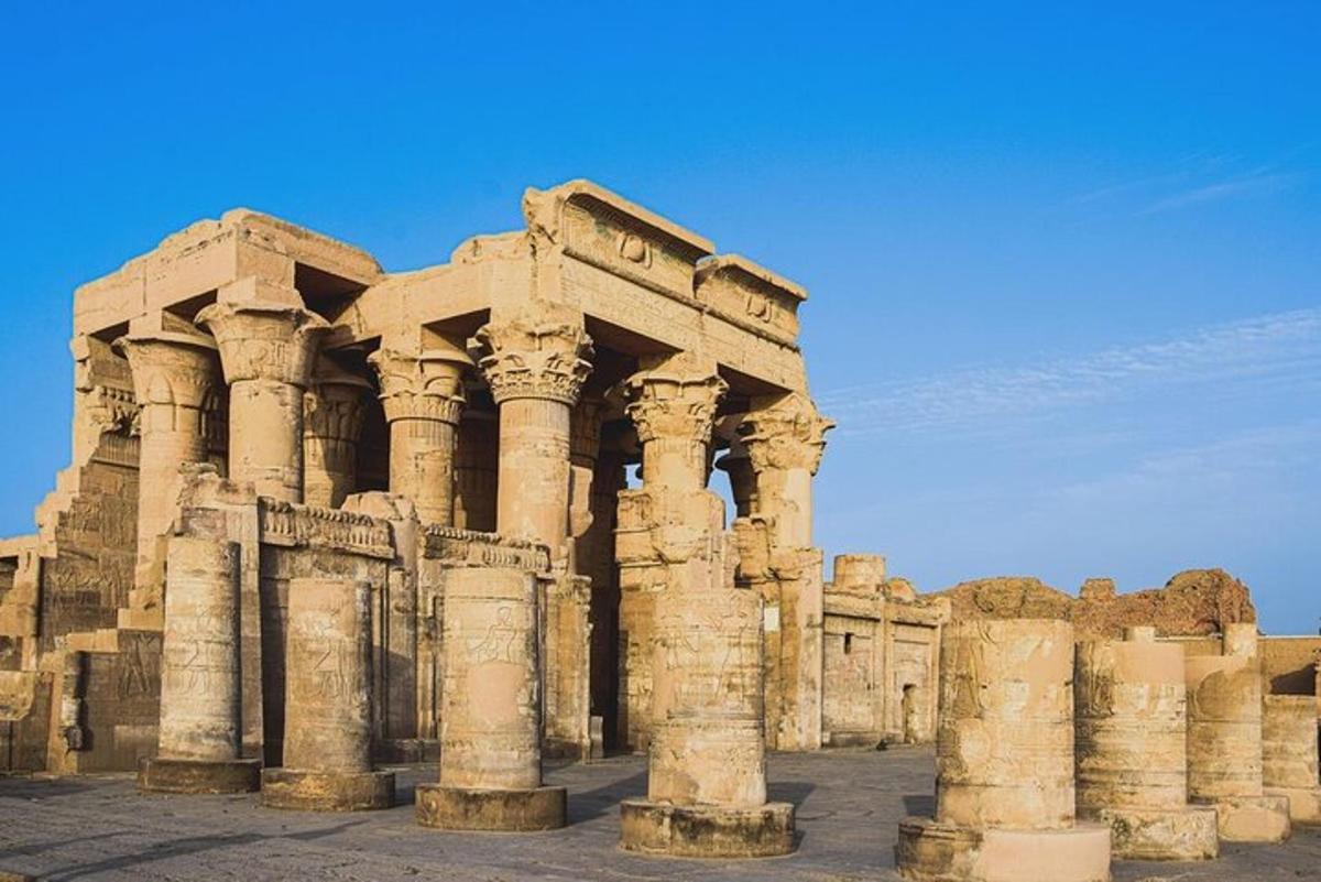 an ancient building with columns in the desert