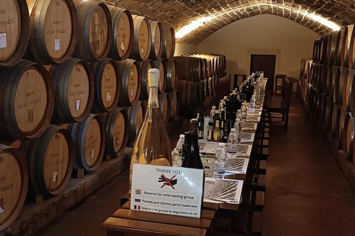 a row of wine bottles in a wine cellar