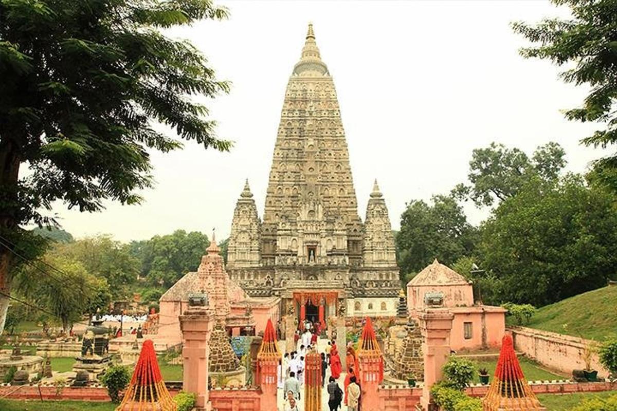 a group of people standing in front of a temple