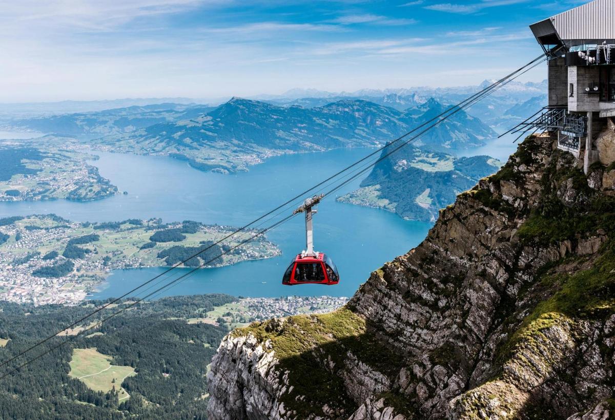 a cable car on the edge of a mountain