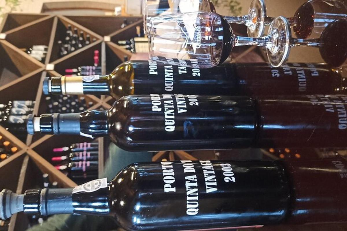 a bunch of wine bottles stacked on top of each other