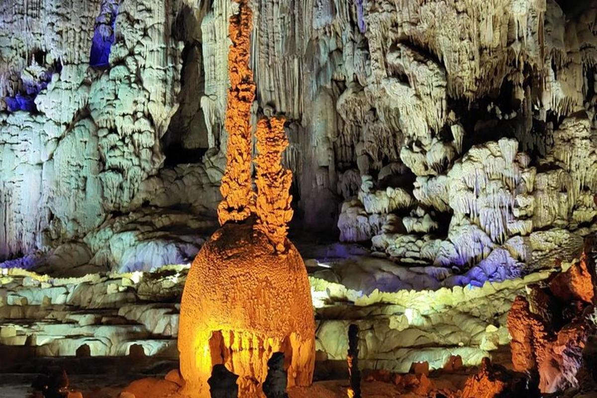a large cave with a cave floor with a cave