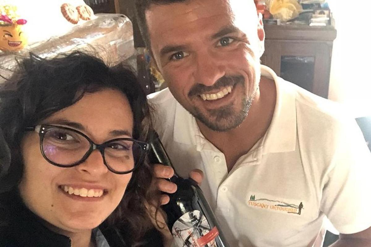 a man and a woman are posing for a picture