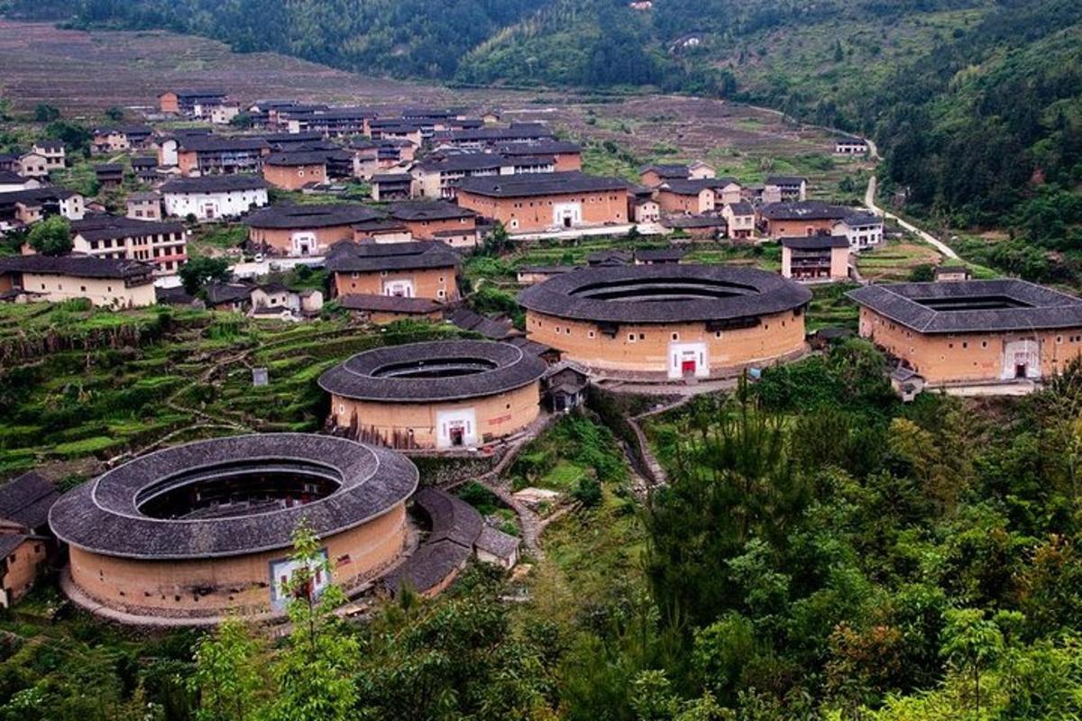 a small town with a bunch of buildings in a valley