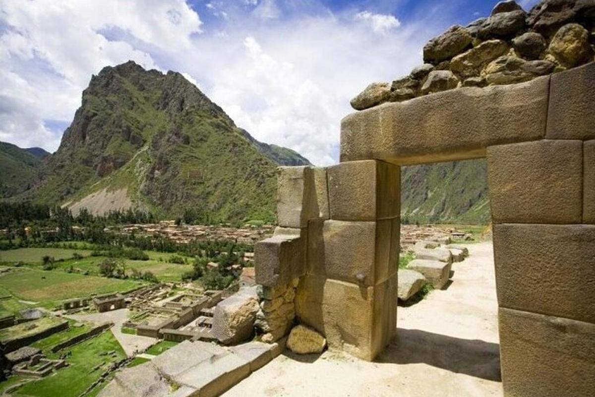 a view of a mountain from the ruins of a building
