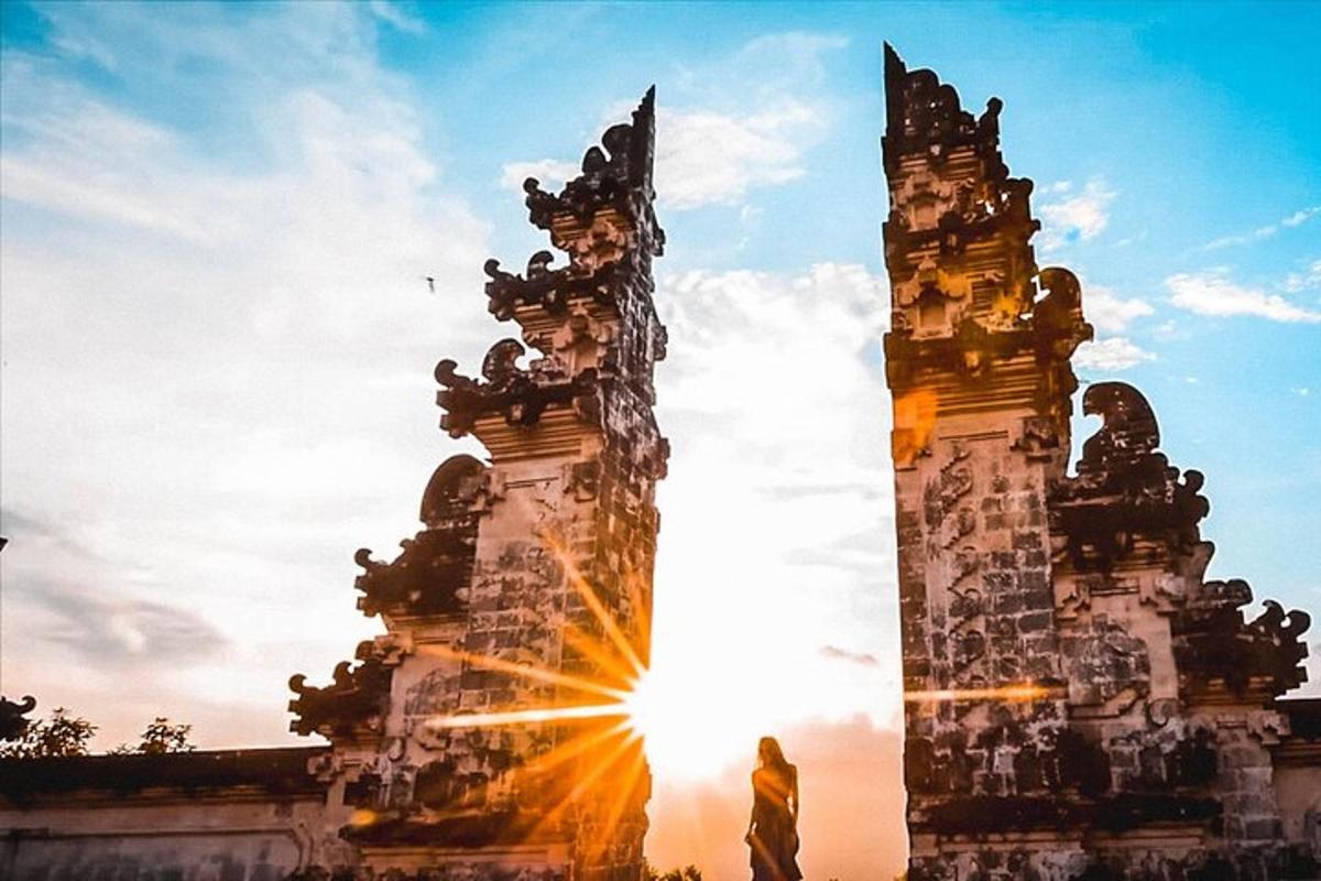 a building with the sun setting behind it