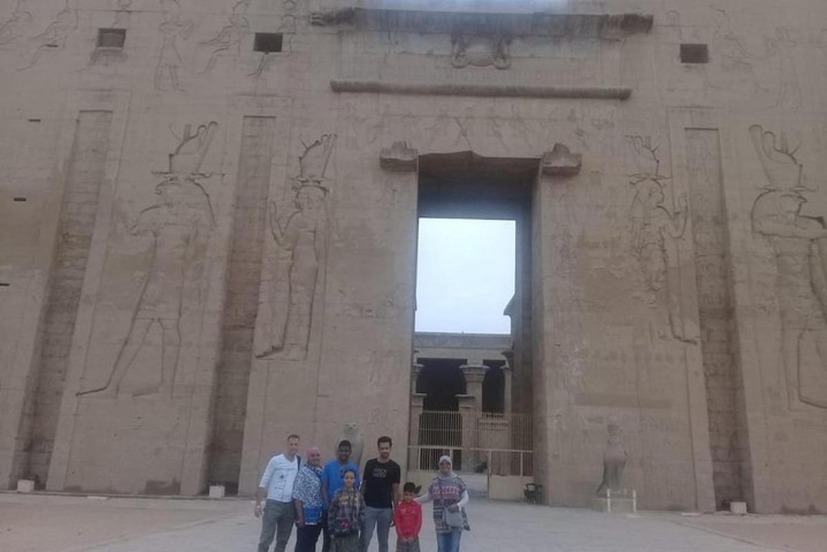 a group of people standing in front of a building
