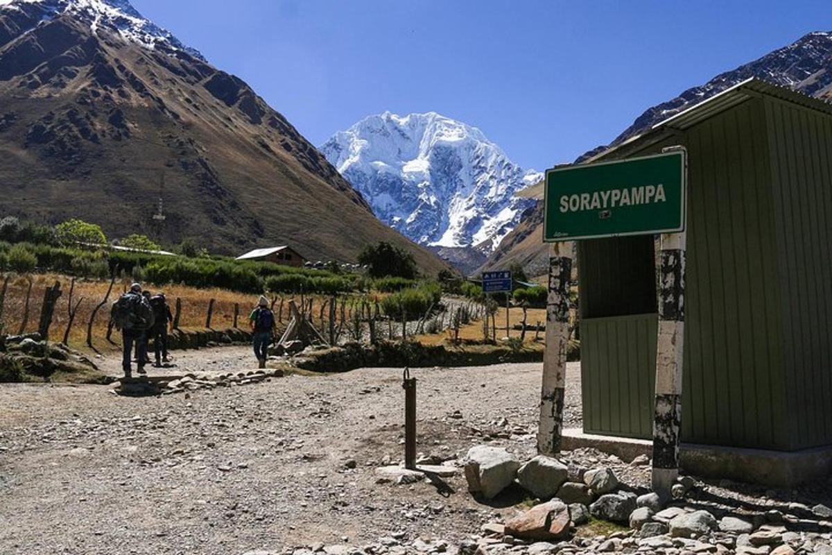 a sign that reads sharmaarma in front of a mountain