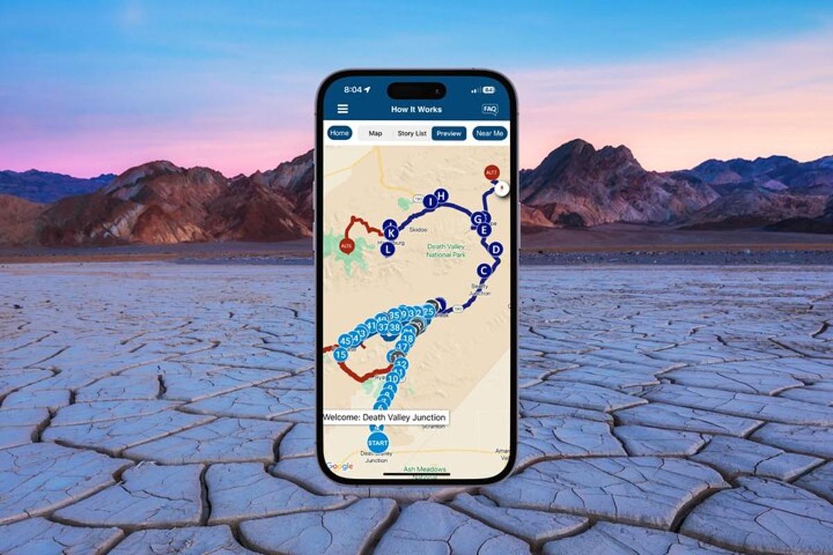 egy mobiltelefon térképpel a repedezett talajon