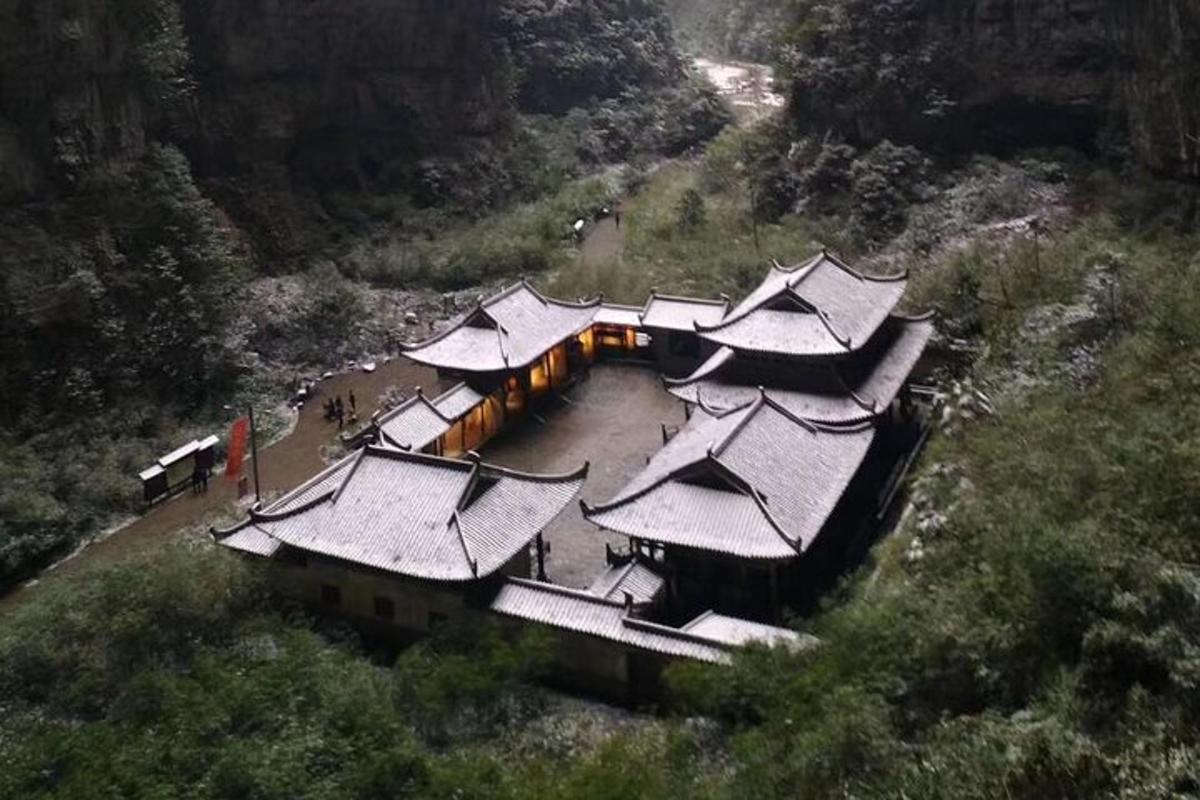 an overhead view of a group of buildings on a hill